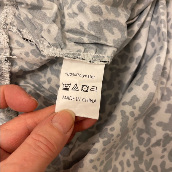 Romantic black & white animal print smocked long sleeve flowy tiered minidress - Picture 11 of 12